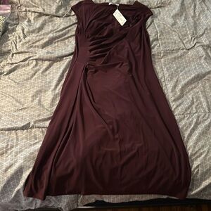 Never worn, beautiful, deep, purple sleeveless unlined dress